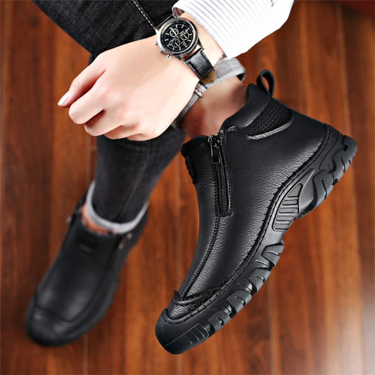 Men's black ankle boots with side zipper and grippy rubber tread sole.
