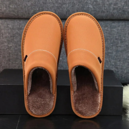 Men's winter indoor slippers in brown with fuzzy dark lining and stitched moccasin style