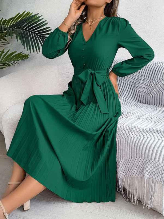 Elegant V-neck Pleated Dress with Button Tie Hem – Timeless Style - Shello's Creative Boutique