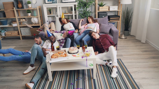 a group of people sitting on top of a couch