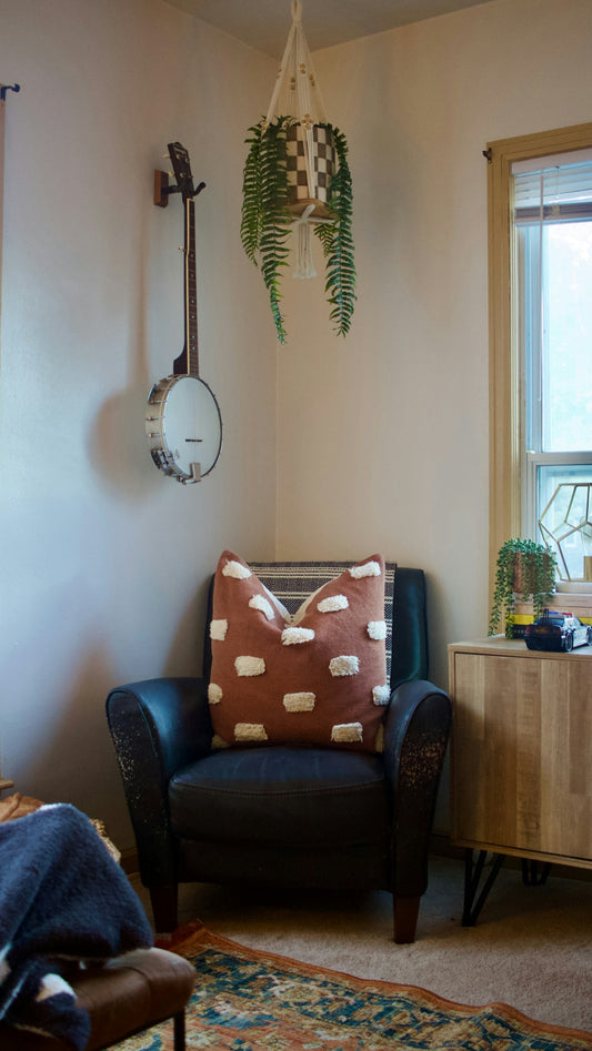 A living room filled with furniture and a window