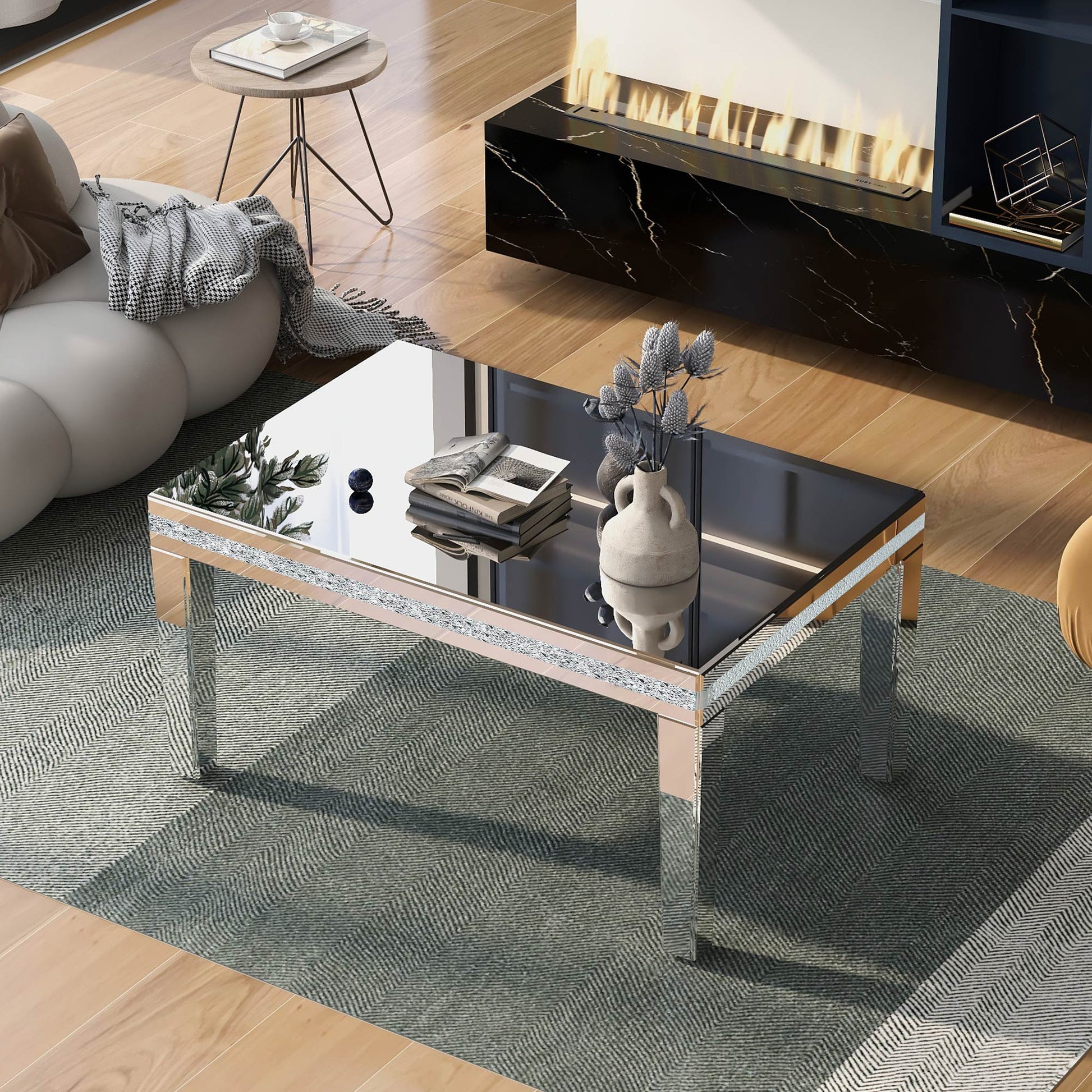 The ON-TRANS stylish modern glass mirrored coffee table features a crystal design and adjustable height legs in silver eprolo