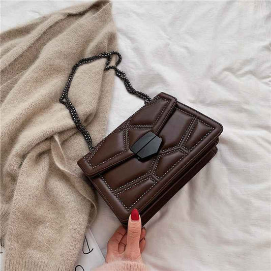 Fashionable & Minimalist Rivet Crossbody Bag – Chic, Edgy, Timeless