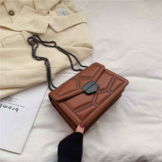 Fashionable & Minimalist Rivet Crossbody Bag – Chic, Edgy, Timeless