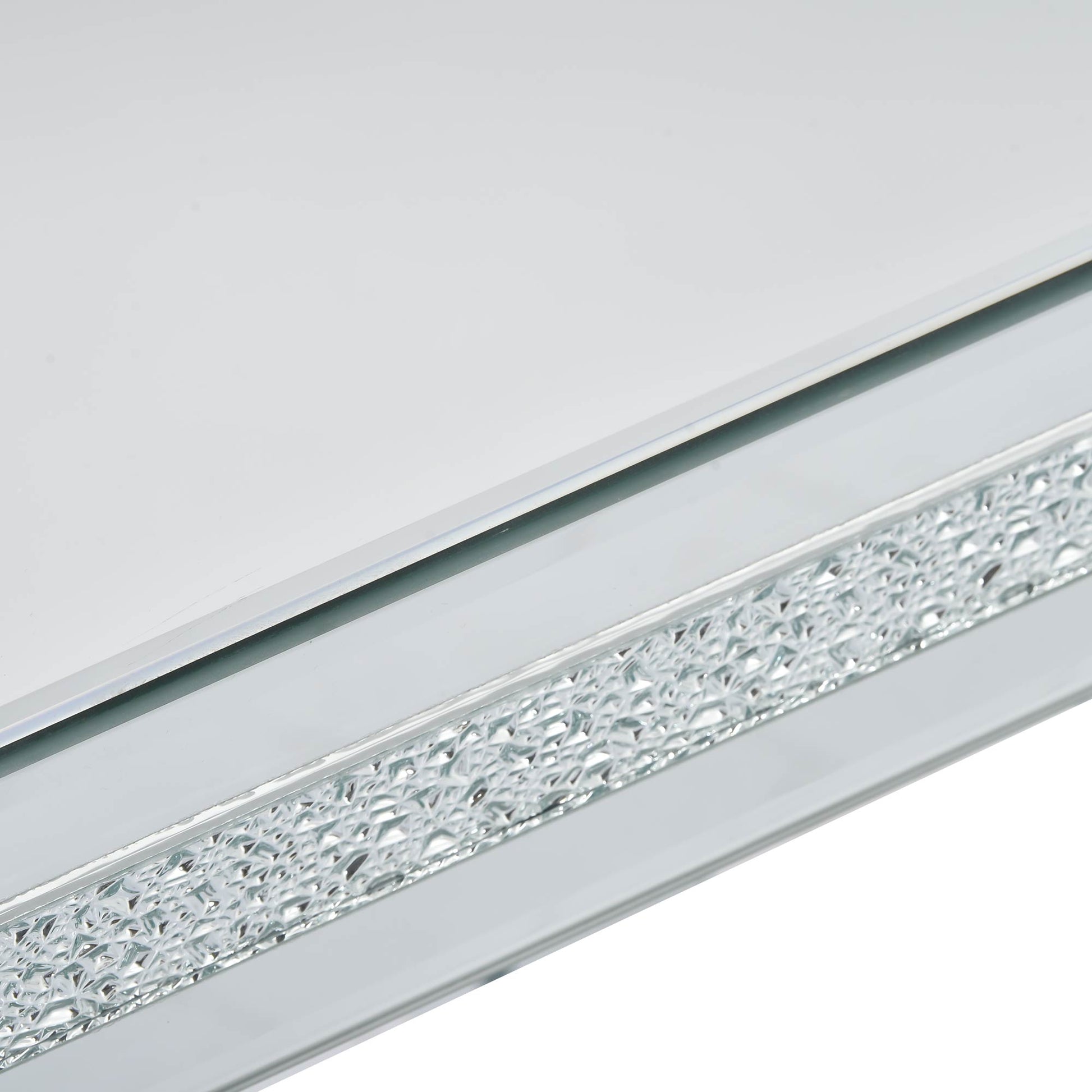 The ON-TRANS stylish modern glass mirrored coffee table features a crystal design and adjustable height legs in silver eprolo