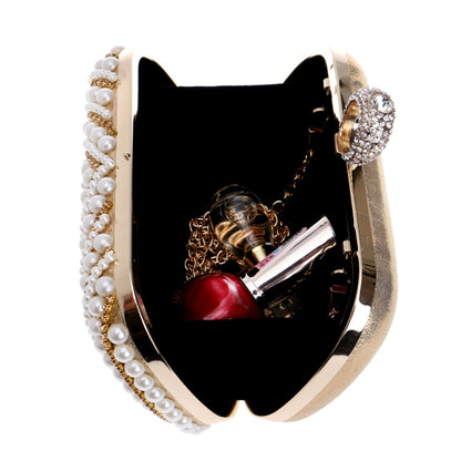 Open pearl evening clutch with gold-tone frame and jeweled clasp