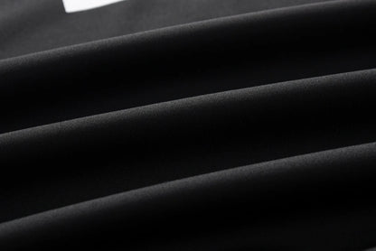 Black fabric close-up with smooth matte texture