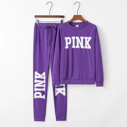 Purple two-piece set with PINK logo sweatshirt and matching jogger pants