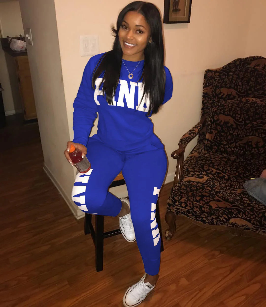 Women's letter-print set: blue long-sleeve top and jogger pants with white NLA side print
