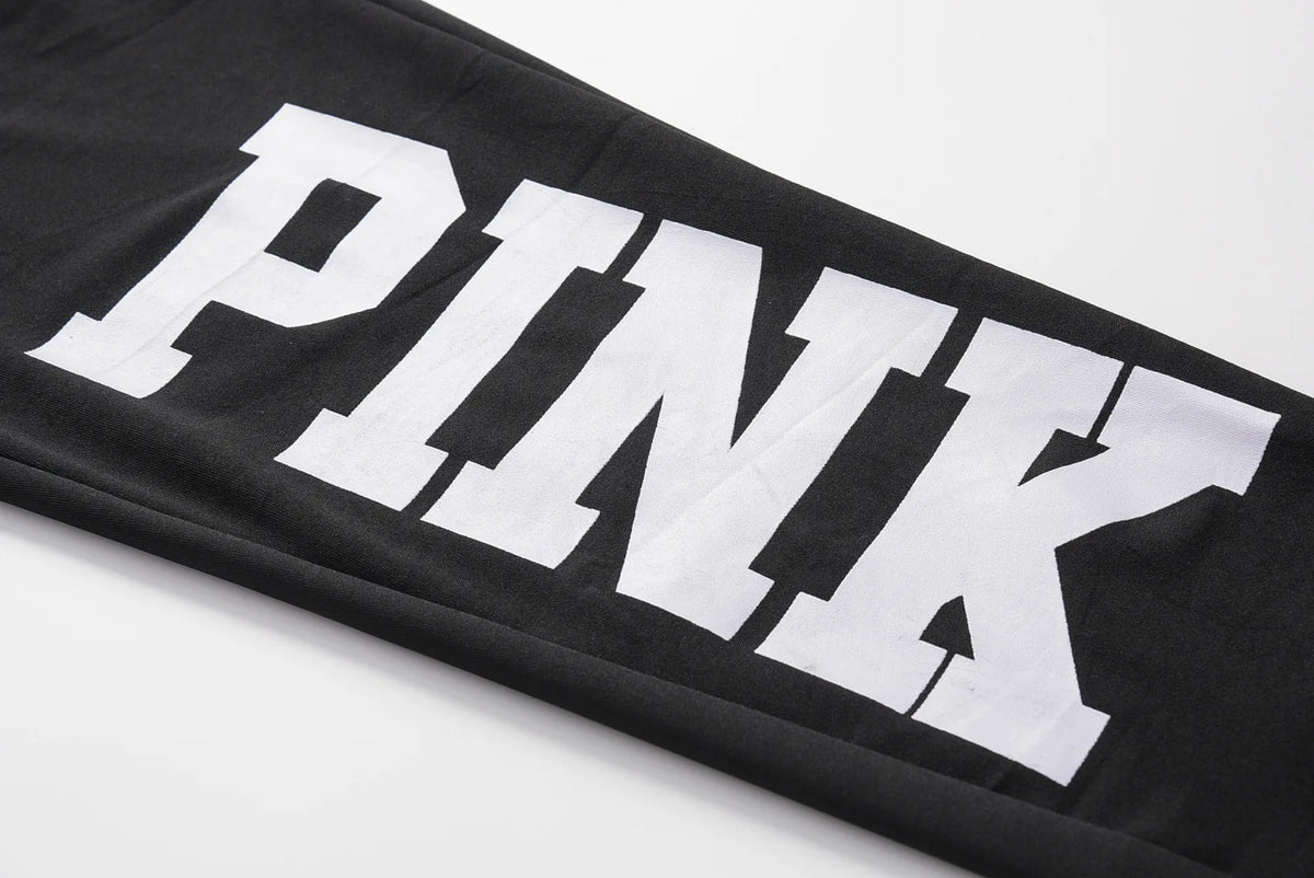 Black sweatshirt sleeve with large white letter print