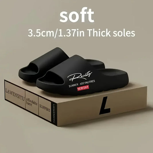 Black printed slide slippers with open-toe design and cushioned thick sole