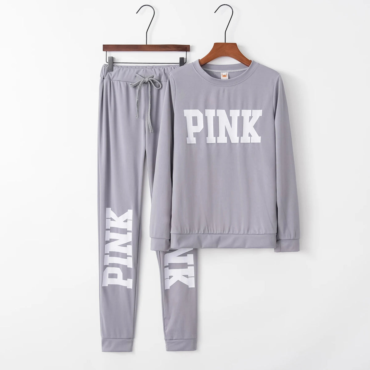 Gray two-piece set with PINK logo sweatshirt and matching jogger pants
