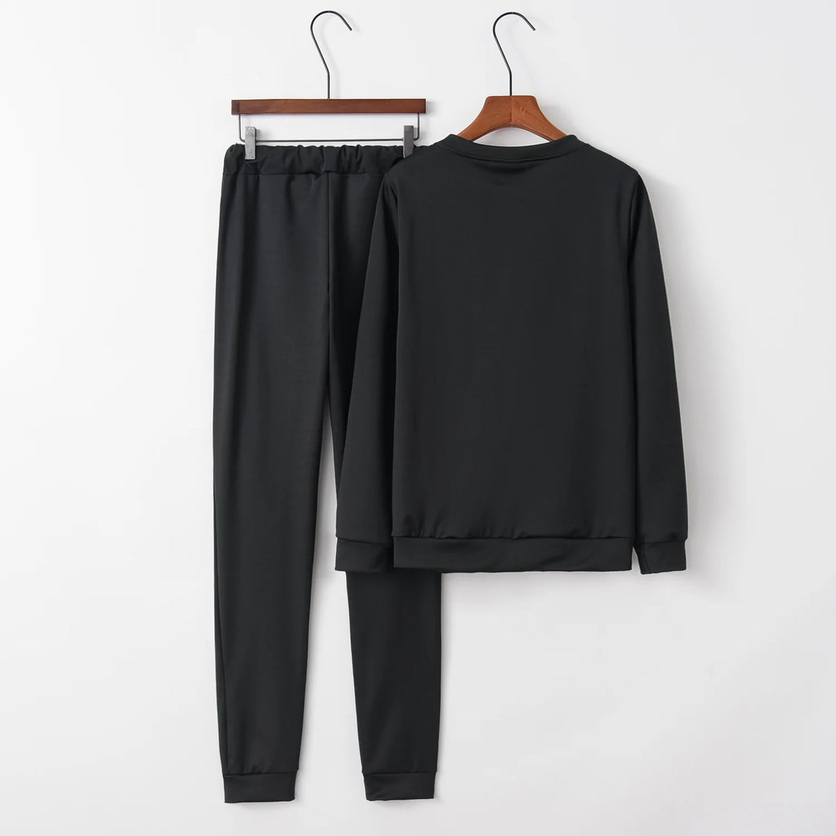 Women’s letter-print two-piece casual set in black: plain sweatshirt and jogger pants