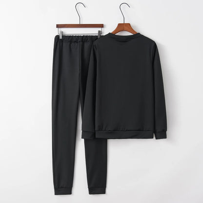 Women’s letter-print two-piece casual set in black: plain sweatshirt and jogger pants