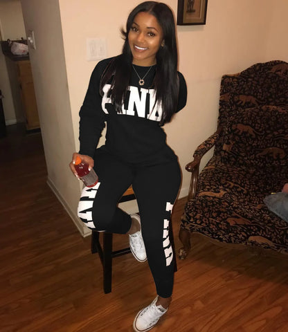 Women's letter-print set in black: white NLA logo on long-sleeve top and jogger pants