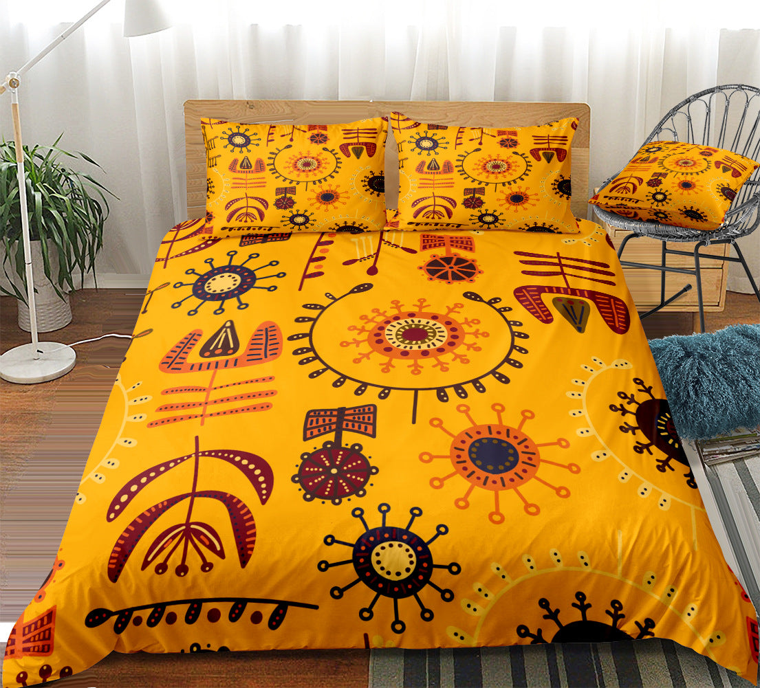 A neatly made bed features the Bohemian Plaid Bedding Set - 3 Piece Duvet & Pillow Covers in bright yellow, with bold sun-inspired and geometric patterns in red, black, and orange. A matching decorative pillow rests on a nearby chair.