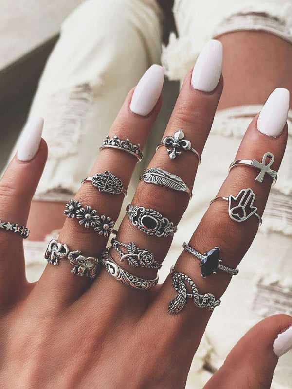Jewelry 15-piece ring personality hollow lotus sunflower geometric black stone set ring Shello's Creative Boutique