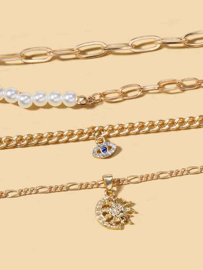 New gold-plated pearl eye multi-layer necklace - Shello's Creative Boutique