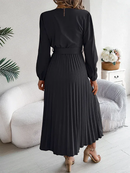 Elegant V-neck Pleated Dress with Button Tie Hem – Timeless Style - Shello's Creative Boutique