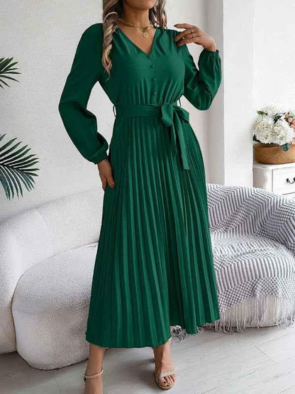 Elegant V-neck Pleated Dress with Button Tie Hem – Timeless Style - Shello's Creative Boutique