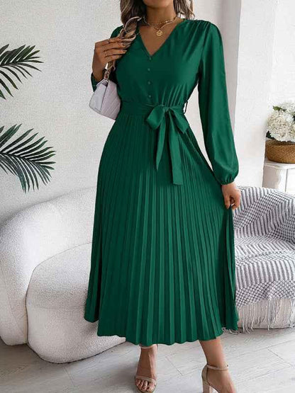 Elegant V-neck Pleated Dress with Button Tie Hem – Timeless Style - Shello's Creative Boutique