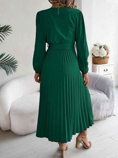 Elegant V-neck Pleated Dress with Button Tie Hem – Timeless Style - Shello's Creative Boutique
