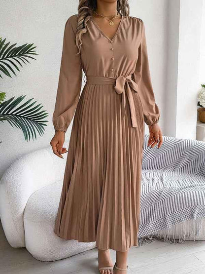 Elegant V-neck Pleated Dress with Button Tie Hem – Timeless Style - Shello's Creative Boutique