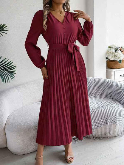 Elegant V-neck Pleated Dress with Button Tie Hem – Timeless Style - Shello's Creative Boutique