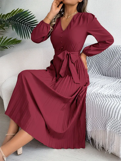 Elegant V-neck Pleated Dress with Button Tie Hem – Timeless Style - Shello's Creative Boutique